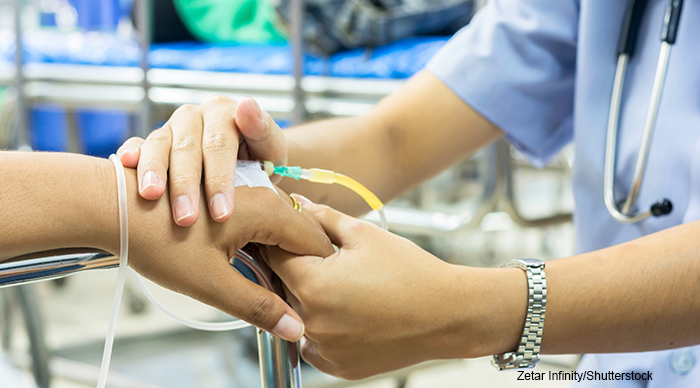 nurse comforting patient